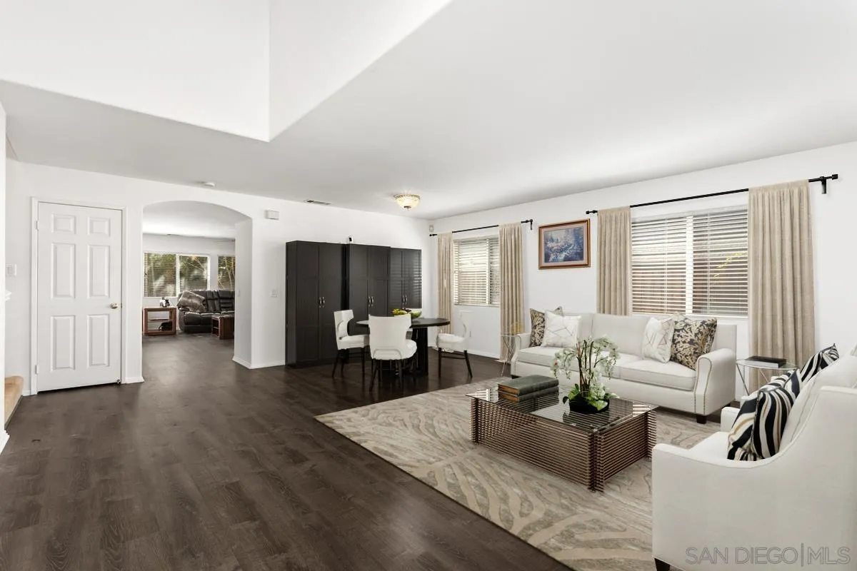 5145 Mendip Street Oceanside, CA 92057 - Photo 4 of 33 a living room with furniture and a flat screen tv