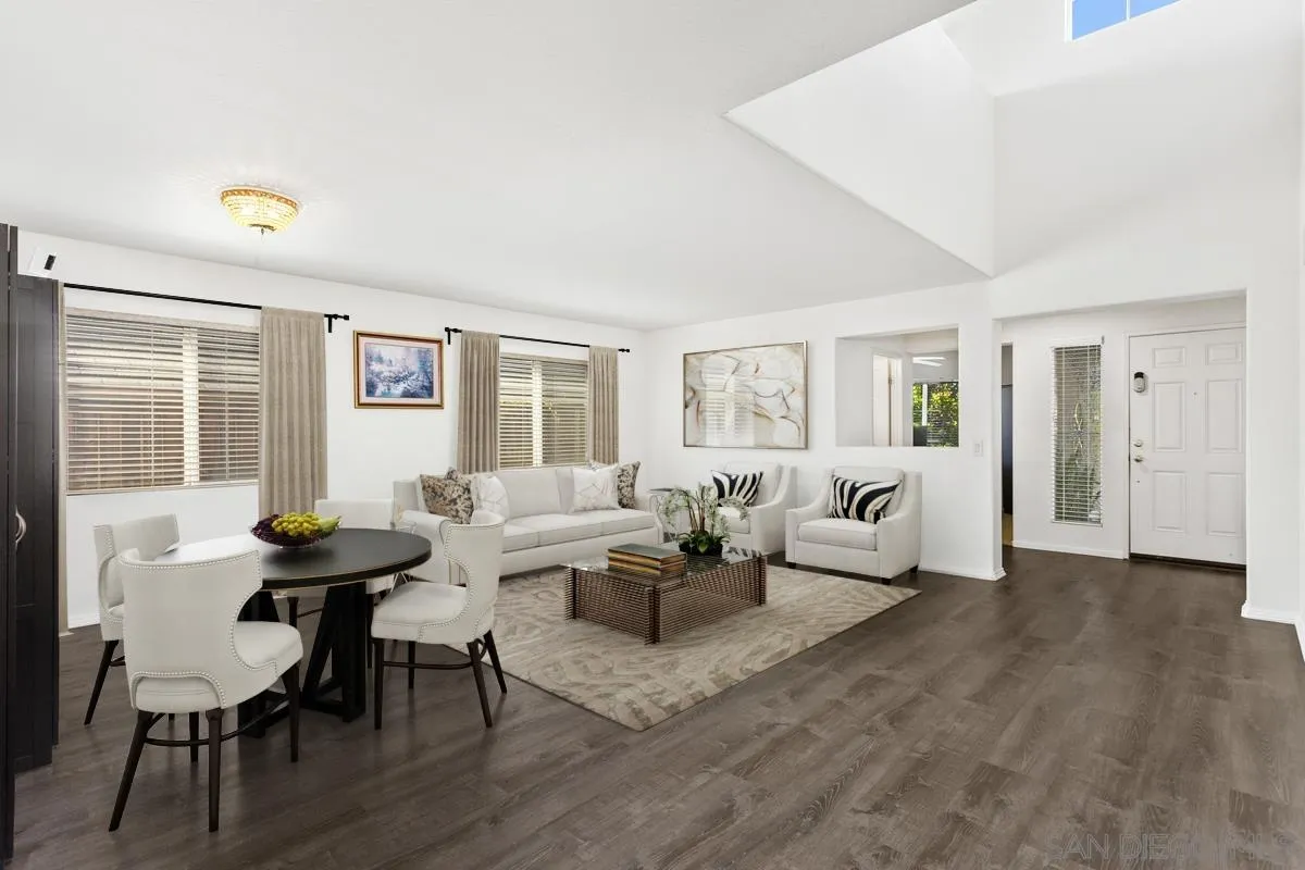 5145 Mendip Street Oceanside, CA 92057 - Photo 7 of 33 a living room with furniture and wooden floor