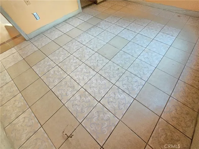 a view of a garage and white wall
