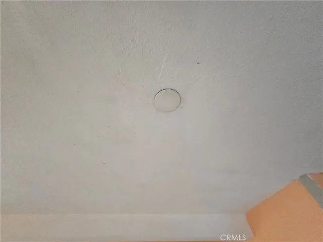 a view of a hallway and closet