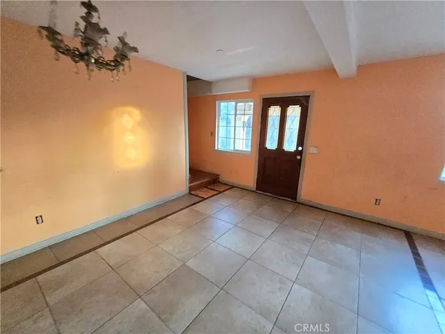 a view of a livingroom with wooden floor