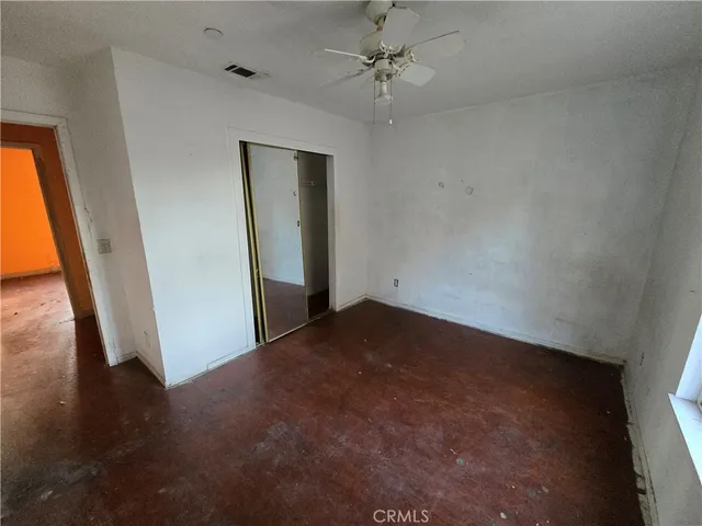 a view of a house with a tree