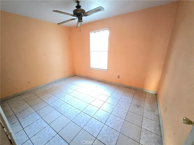 en empty room with windows