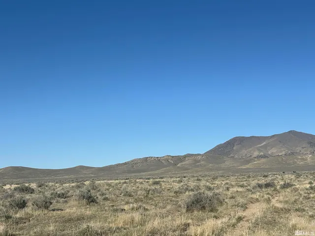 a view of mountain and a mountain