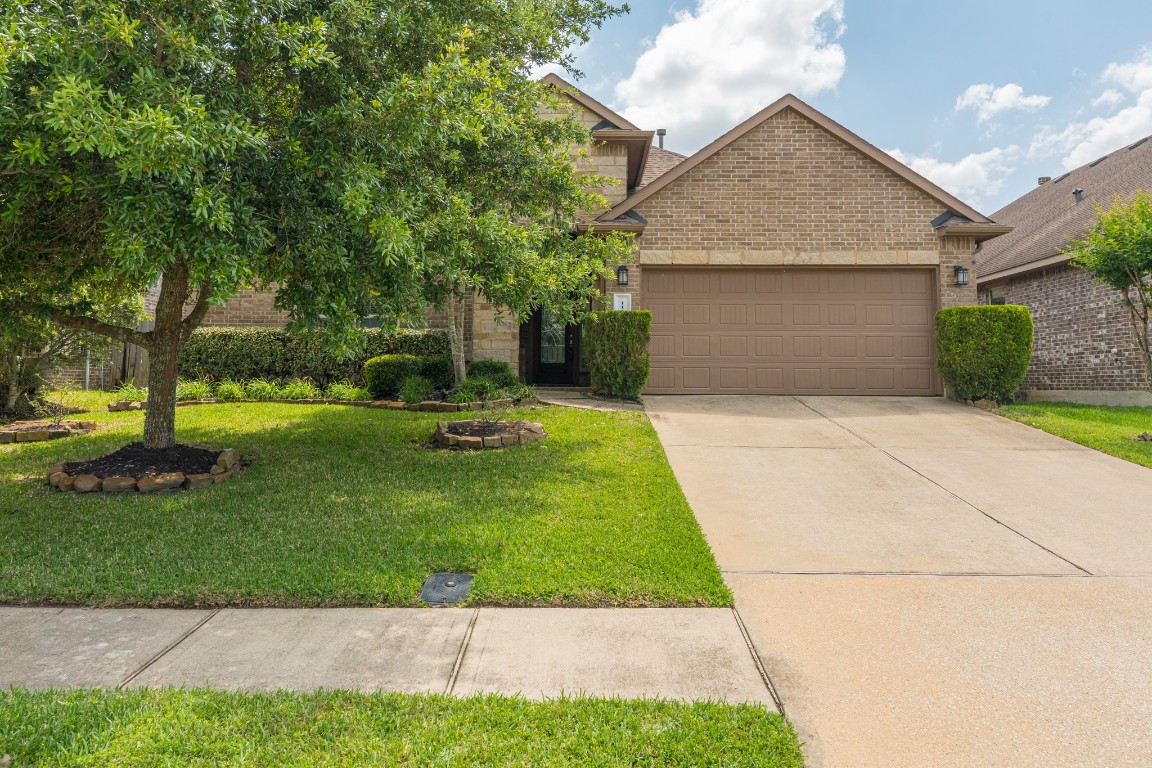 111 Pheasant Run Drive Conroe, TX 77384 - Photo 1 of 50 Step into effortless living with this move-in ready residence, ideally located near The Woodlands and zoned to highly regarded Conroe ISD schools, including The Woodlands College Park High School, adding exceptional educational value.