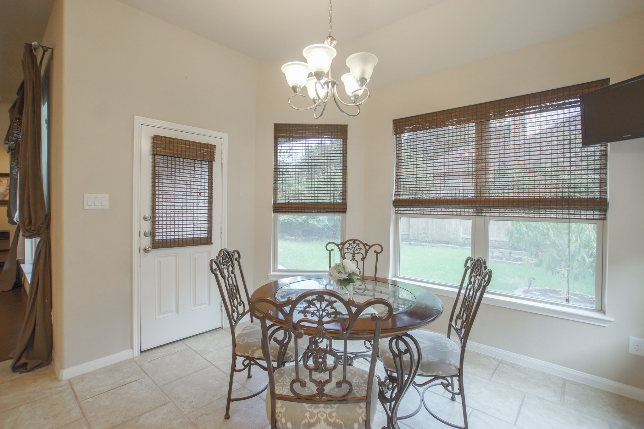 111 Pheasant Run Drive Conroe, TX 77384 - Photo 23 of 50 a view of a dining room with furniture and window