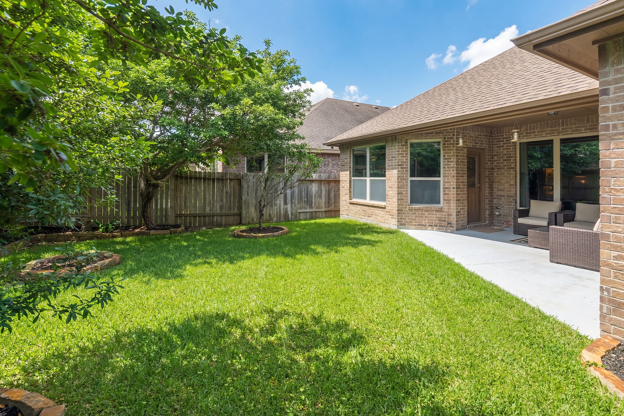 111 Pheasant Run Drive Conroe, TX 77384 - Photo 41 of 50 Backyard space provides plenty of room for gatherings, play, or future customization to suit your outdoor lifestyle needs.