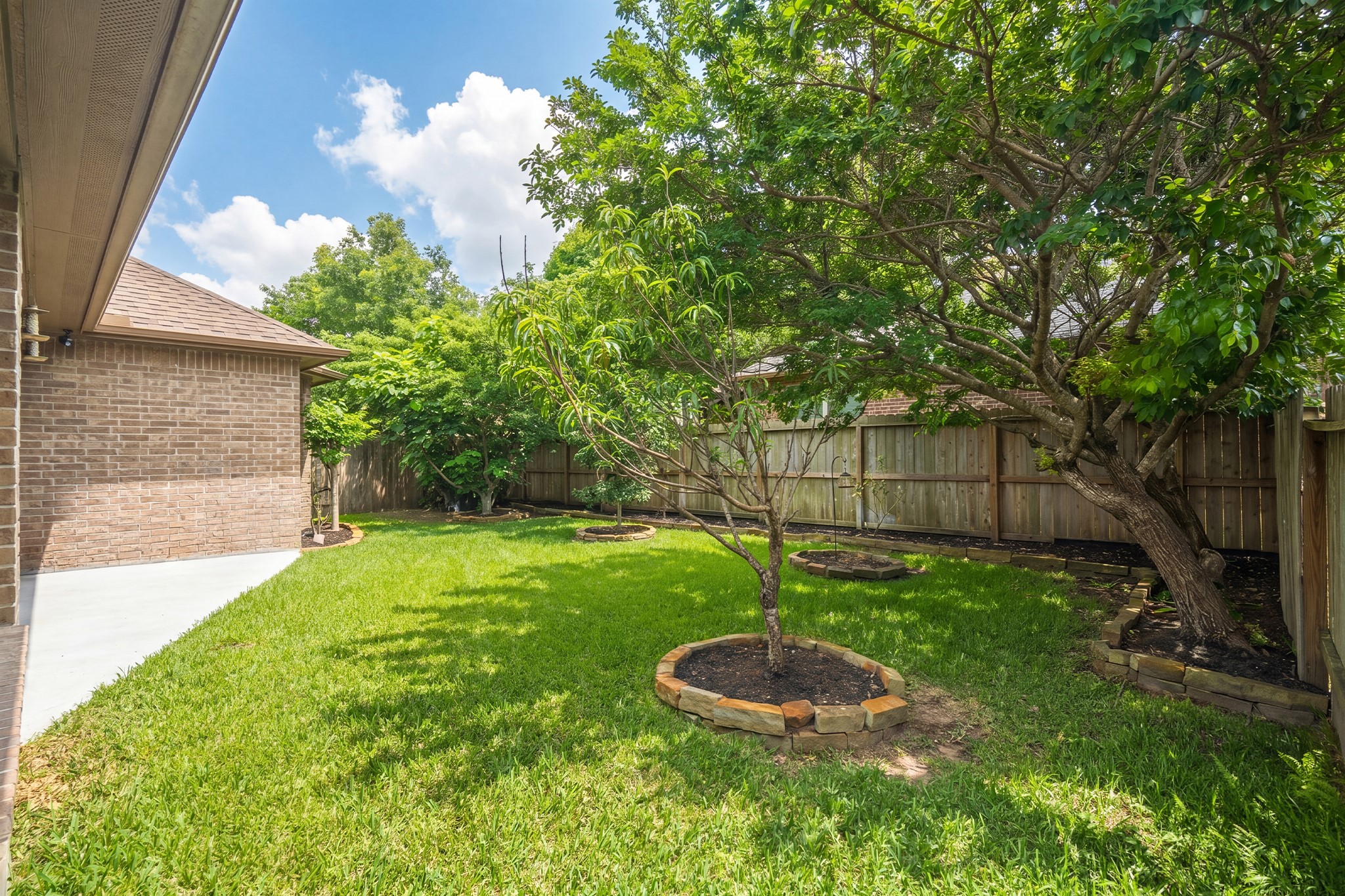 111 Pheasant Run Drive Conroe, TX 77384 - Photo 42 of 50 Generous covered patio offers the perfect space for outdoor dining, entertaining, or simply relaxing while enjoying the backyard.
