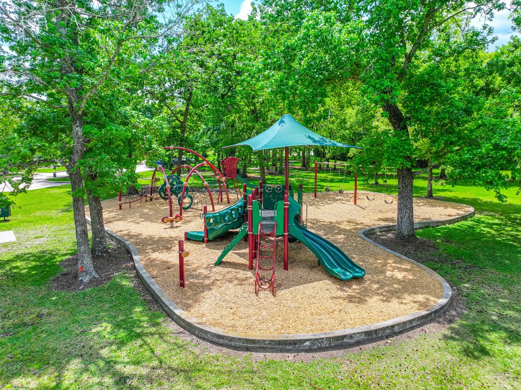 111 Pheasant Run Drive Conroe, TX 77384 - Photo 47 of 50 Jacobs Reserve offers an active lifestyle with miles of wooded walking and biking trails, a stocked fishing pond, and outdoor fitness areas, creating the perfect balance of nature, wellness, and community living.