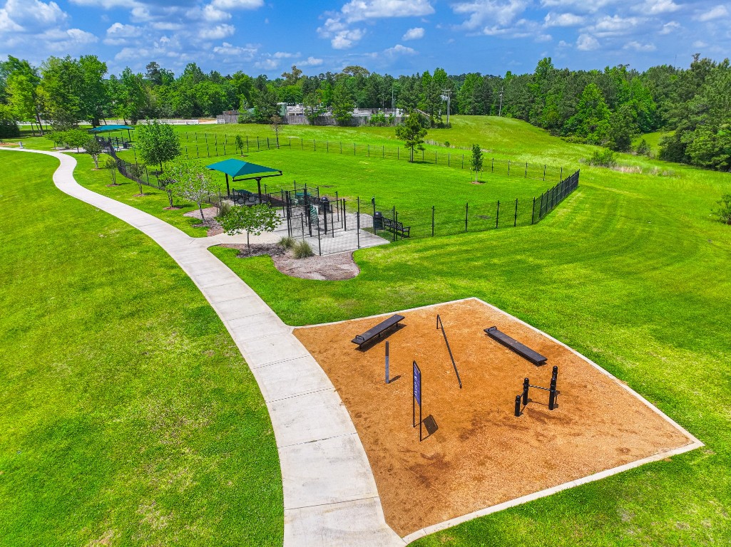 111 Pheasant Run Drive Conroe, TX 77384 - Photo 48 of 50 This master-planned community features parks, playgrounds, and gathering spaces that foster a strong sense of community, making Jacobs Reserve an ideal place for families and those seeking a connected neighborhood environment.