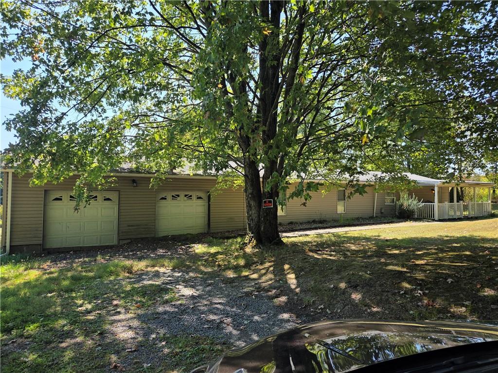 223 Nichol Road Georgetown, PA 15043 - Photo 1 of 2 a backyard of a house