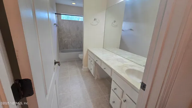 a view of a backyard with garden