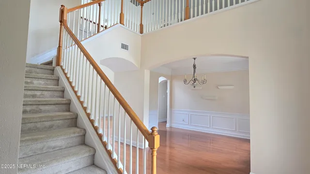 a view of staircase with white walls and white walls