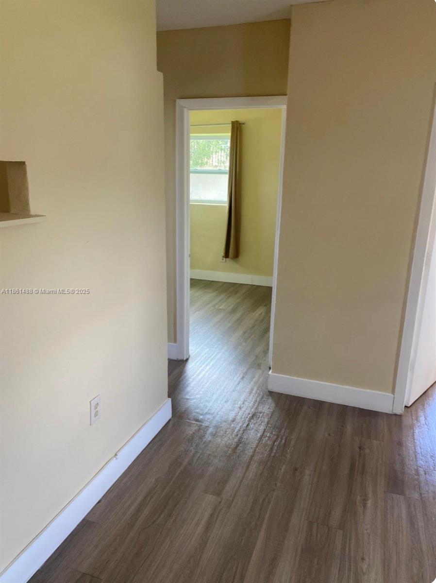 1111 Southwest 2nd Street, Unit 1111 Homestead, FL 33030 - Photo 11 of 15 a view of a room with wooden floor