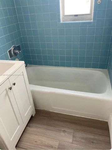a bathroom with a bathtub