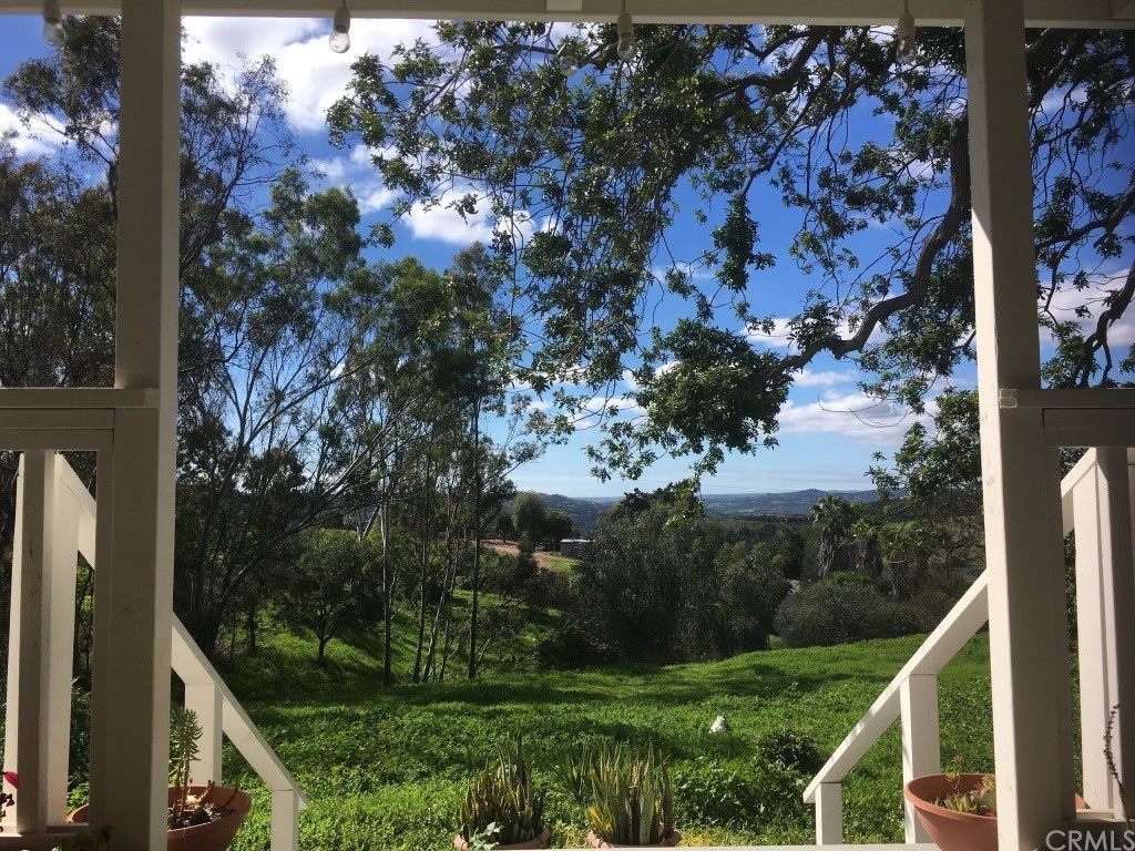 31812 Rancho Amigos Road Bonsall, CA 92003 - Photo 1 of 1 a view of a yard with a tree