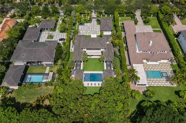 an aerial view of a house with a garden
