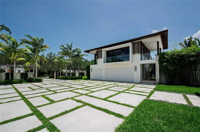 a house with yard in front of it