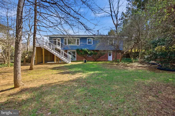 a view of a field with trees