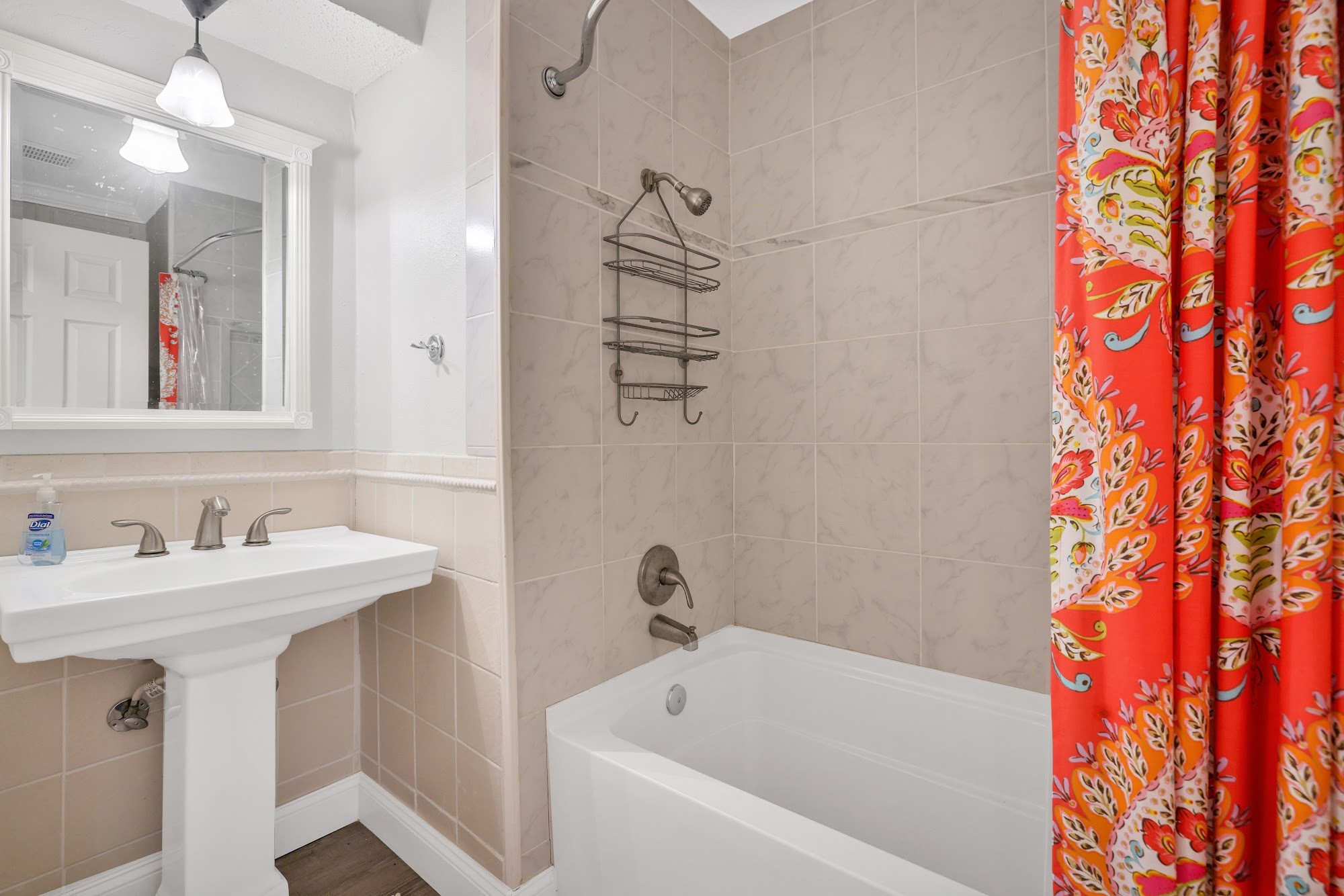 148 South Oak Bluff Street Trinity, TX 75862 - Photo 30 of 46 a bathroom with a sink and a bathtub
