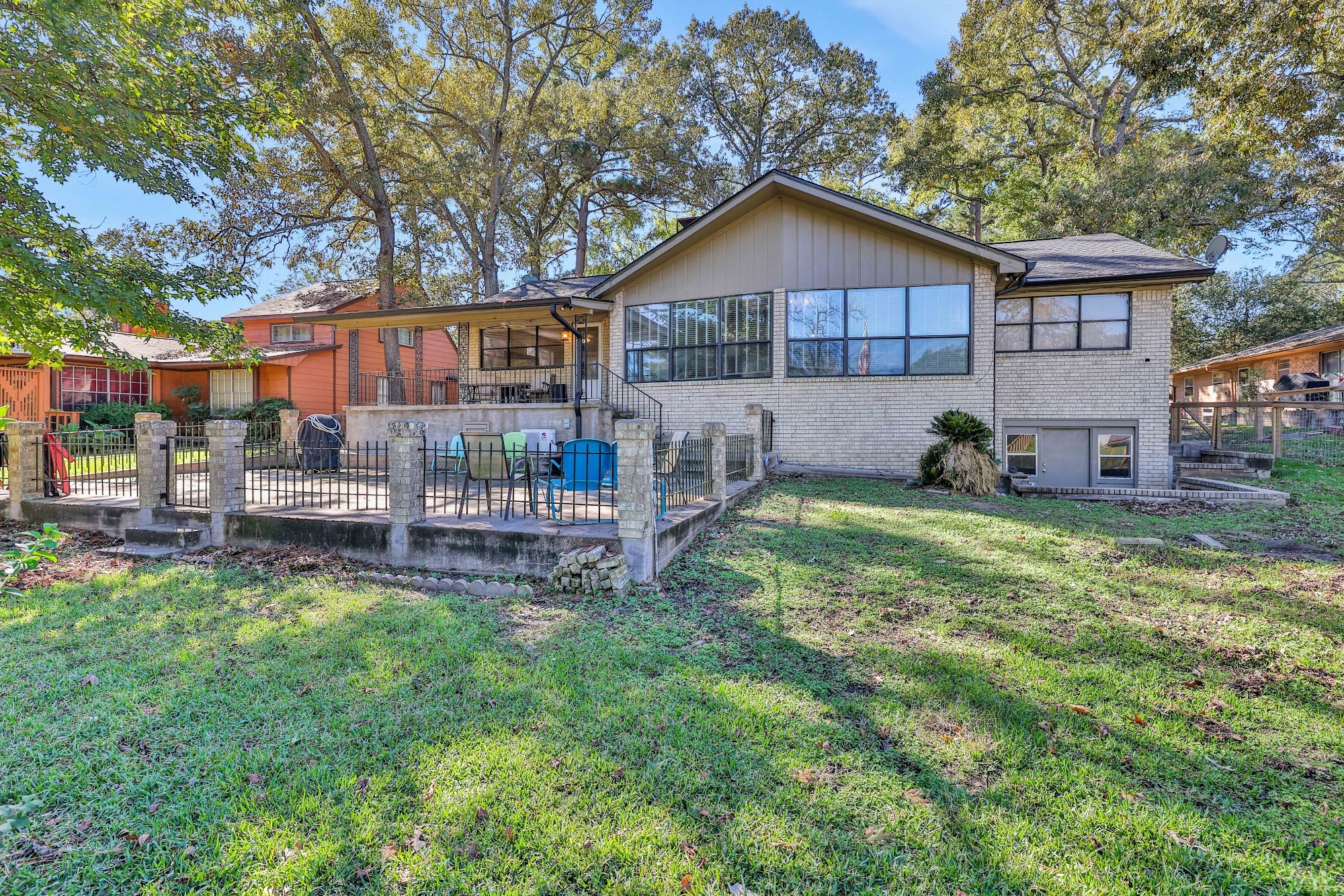 148 South Oak Bluff Street Trinity, TX 75862 - Photo 43 of 46 a view of a house with a yard and sitting area