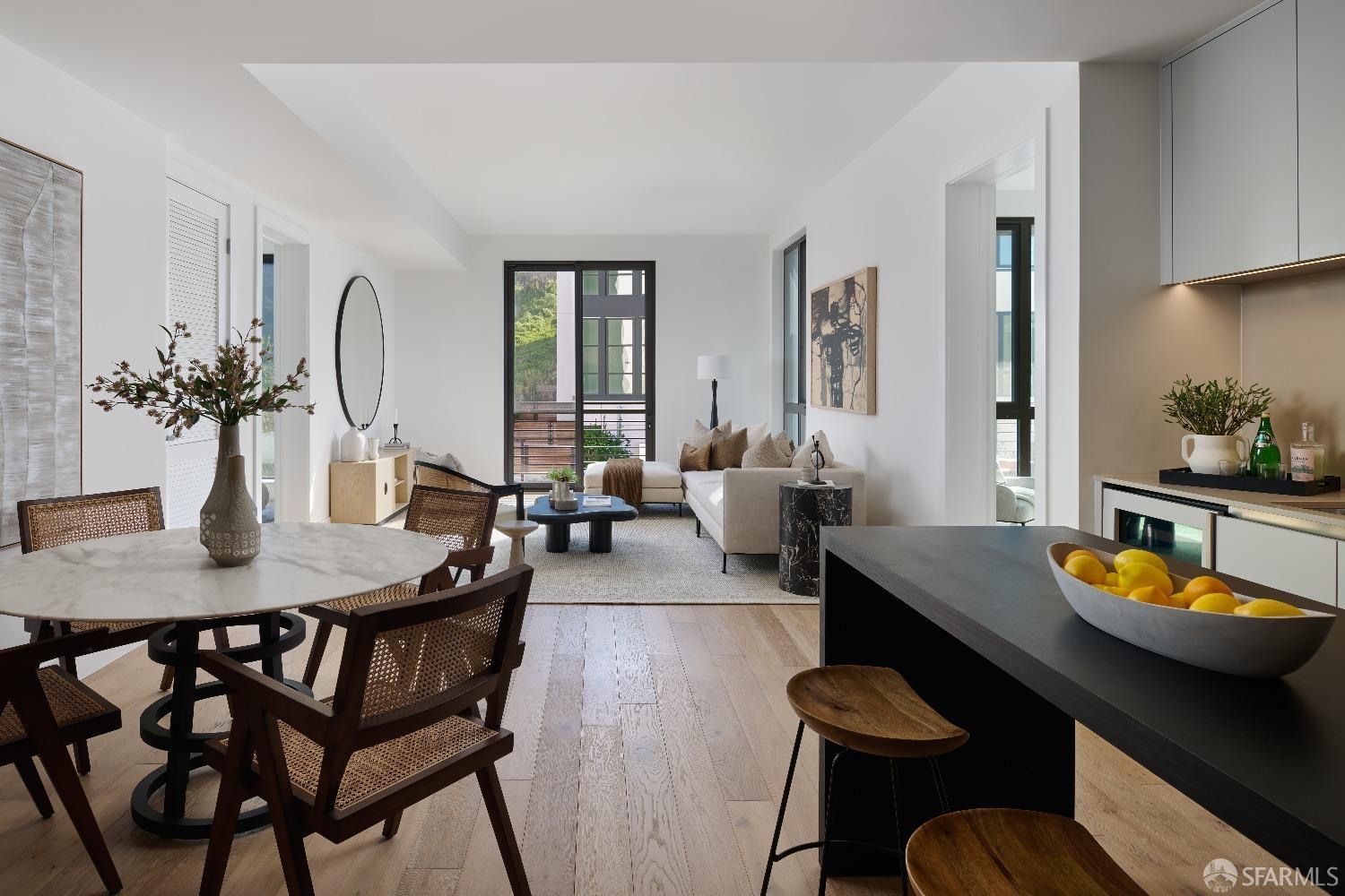 a view of a dining room with furniture and window