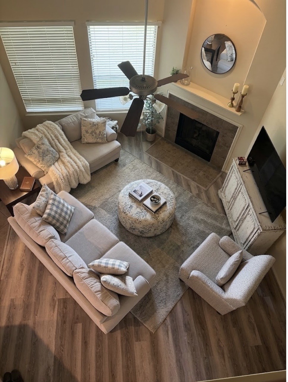 118 East Lasting Spring Circle Spring, TX 77389 - Photo 17 of 46 Virtually staged Experience cozy elegance in this virtually staged living room, featuring plush seating, a charming fireplace, and abundant natural light.