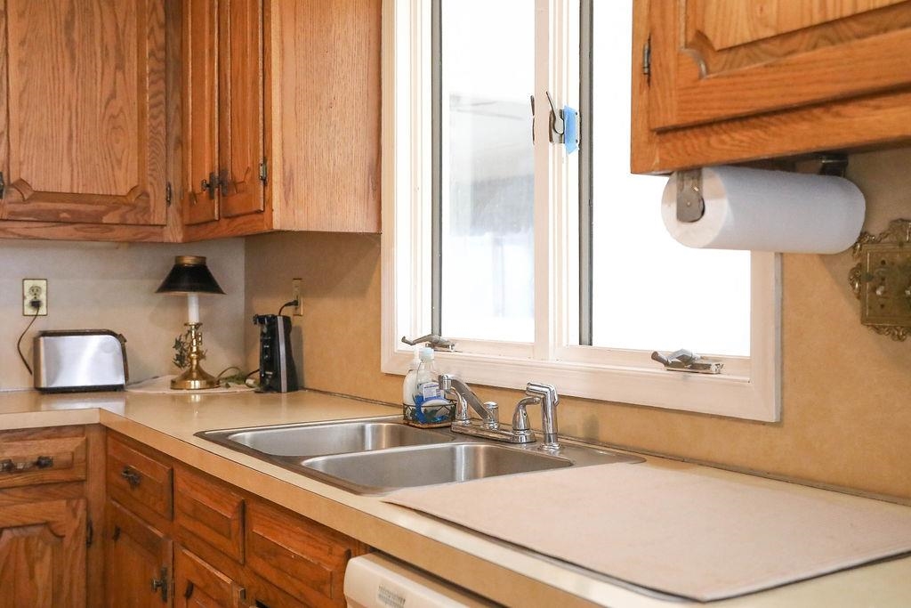 1401 Ladd Road Waynesboro, VA 22980 - Photo 22 of 53 a kitchen with stainless steel appliances a sink a stove and a microwave