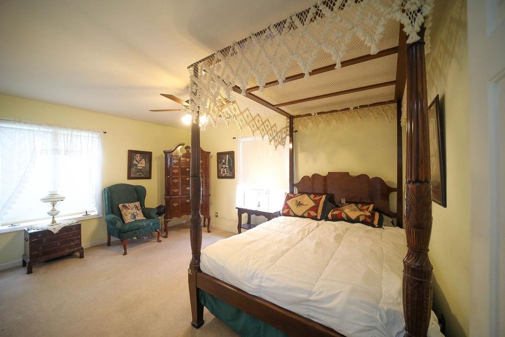 1401 Ladd Road Waynesboro, VA 22980 - Photo 30 of 53 a bed room with a bed and chair