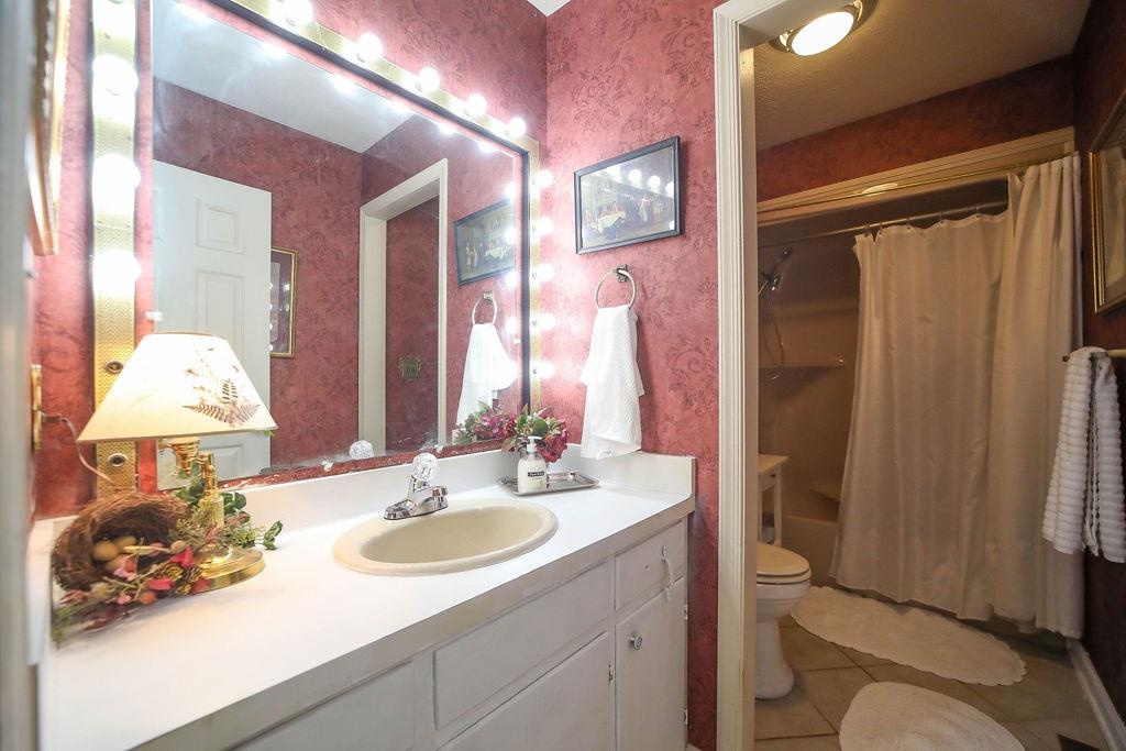 1401 Ladd Road Waynesboro, VA 22980 - Photo 50 of 53 a bathroom with a sink toilet vanity and shower