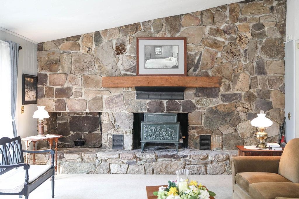 1401 Ladd Road Waynesboro, VA 22980 - Photo 6 of 53 a living room with furniture and a fireplace