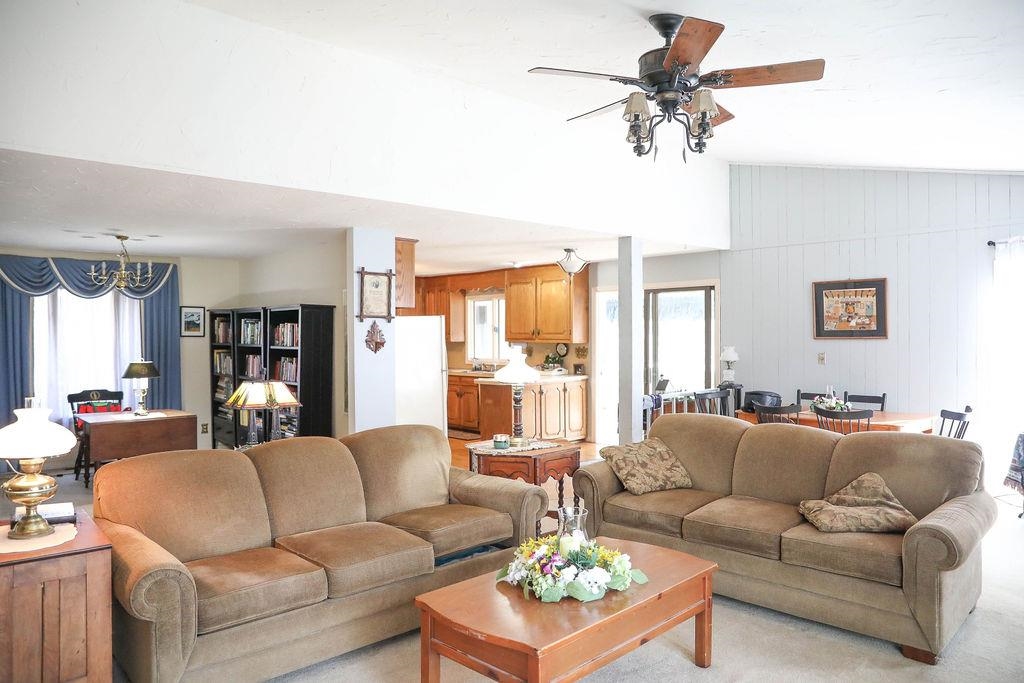 1401 Ladd Road Waynesboro, VA 22980 - Photo 9 of 53 a living room with furniture ceiling fan and a rug