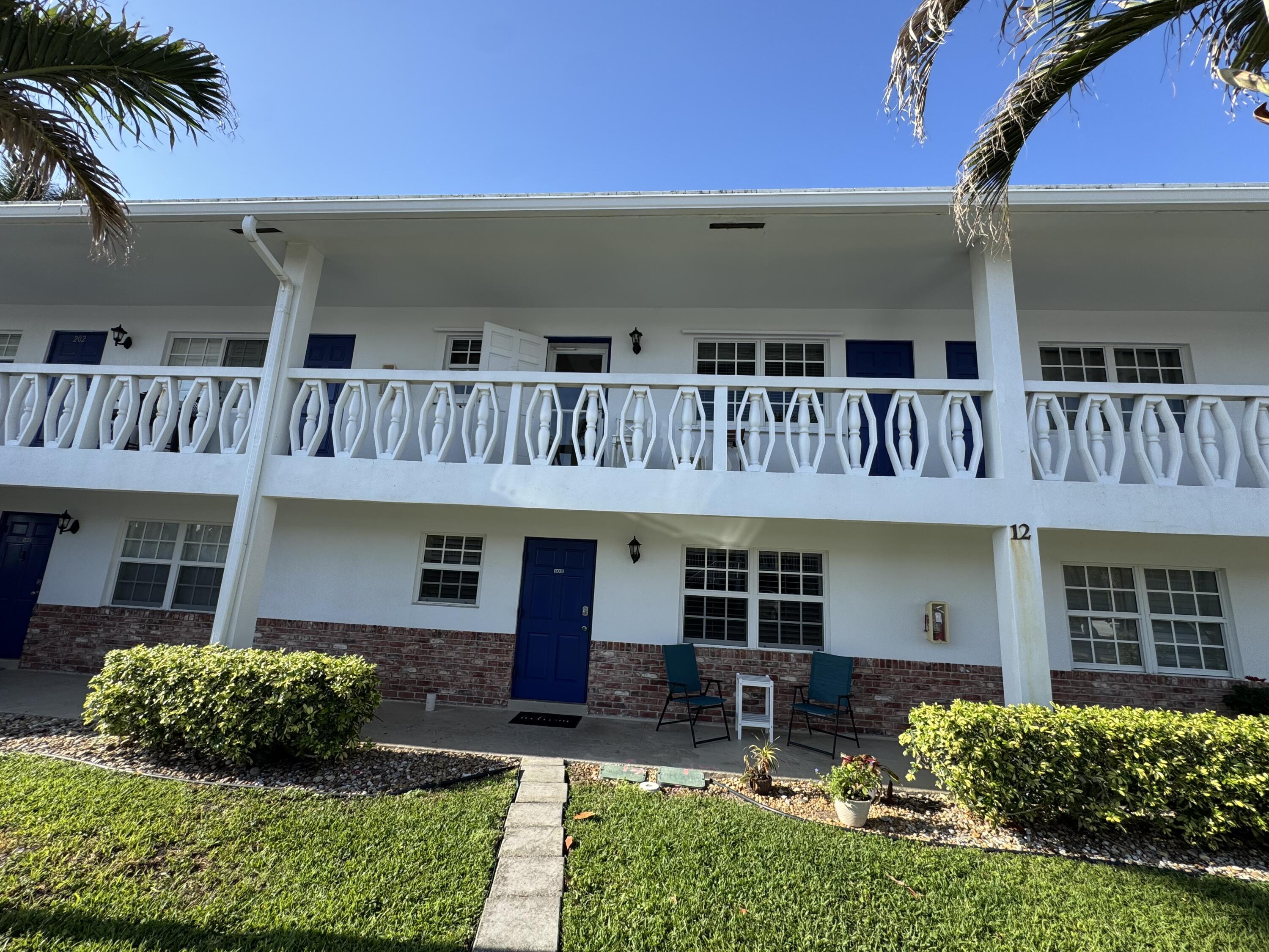 5505 North Ocean Boulevard, Unit 12103 Ocean Ridge, FL 33435 - Photo 12 of 28 a front view of house with yard outdoor seating and entertaining space