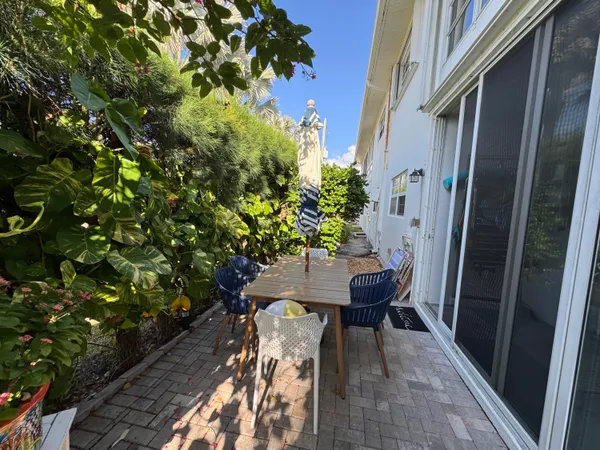 a view of balcony with a potted plant