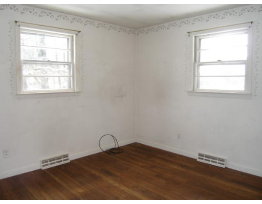 4 Rice Street Hopkinton, MA 01748 - Photo 9 of 17 a view of empty room with wooden floor