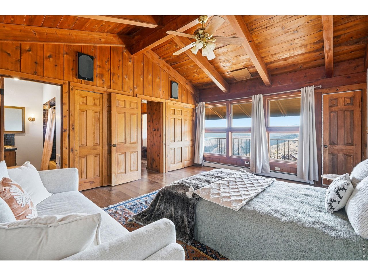 393 Dixon Road Boulder, CO 80302 - Photo 25 of 50 Bedroom #3 - en suite with vaulted/beamed ceilings and south views