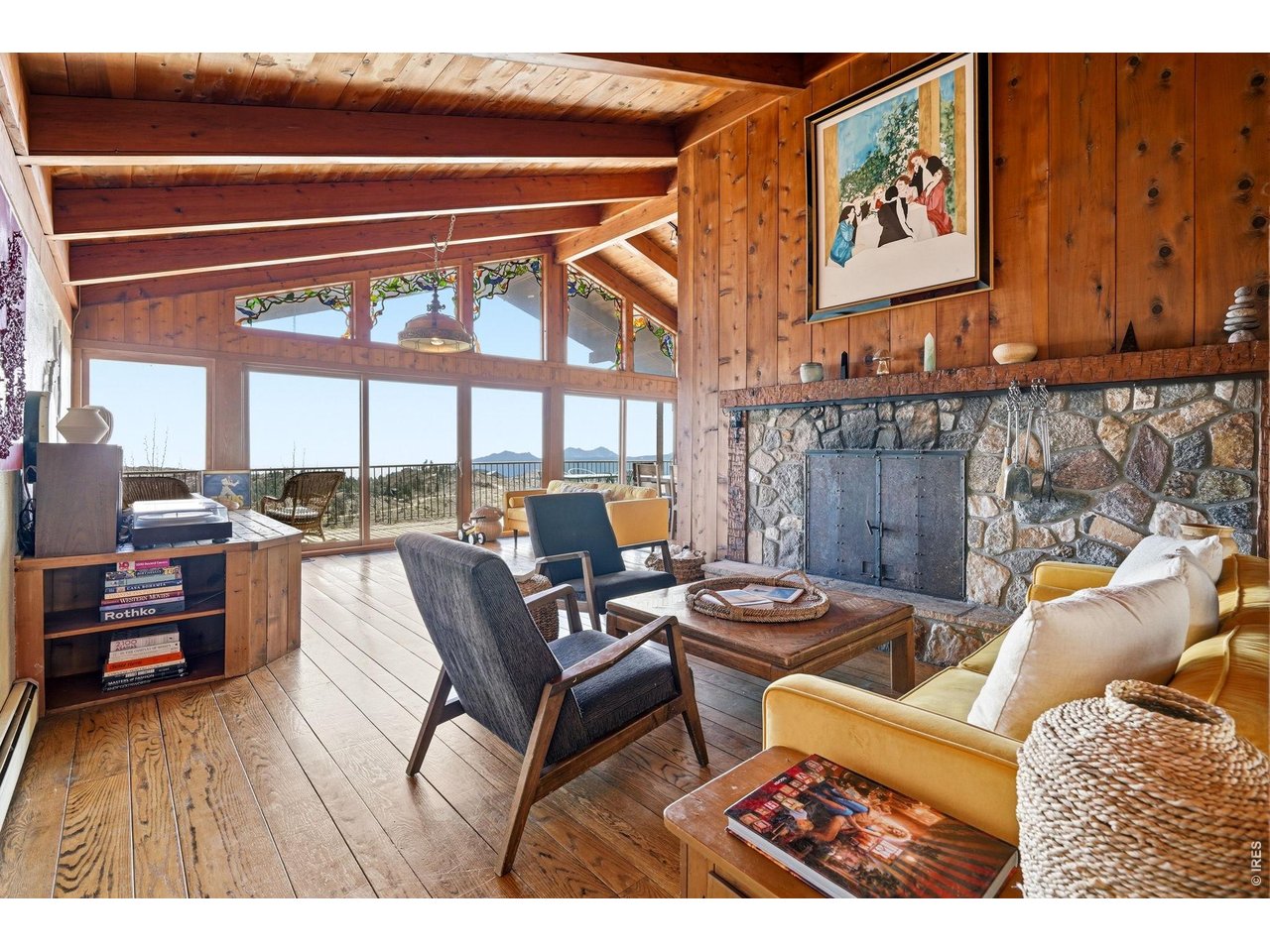 393 Dixon Road Boulder, CO 80302 - Photo 5 of 50 Living room with vaulted ceiling & beams framing southern views