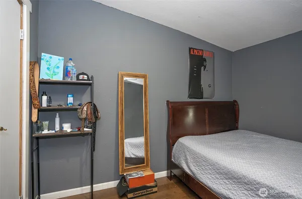 a bedroom with a bed and a cabinets