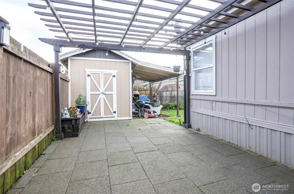 a view of outdoor space with playground and green space