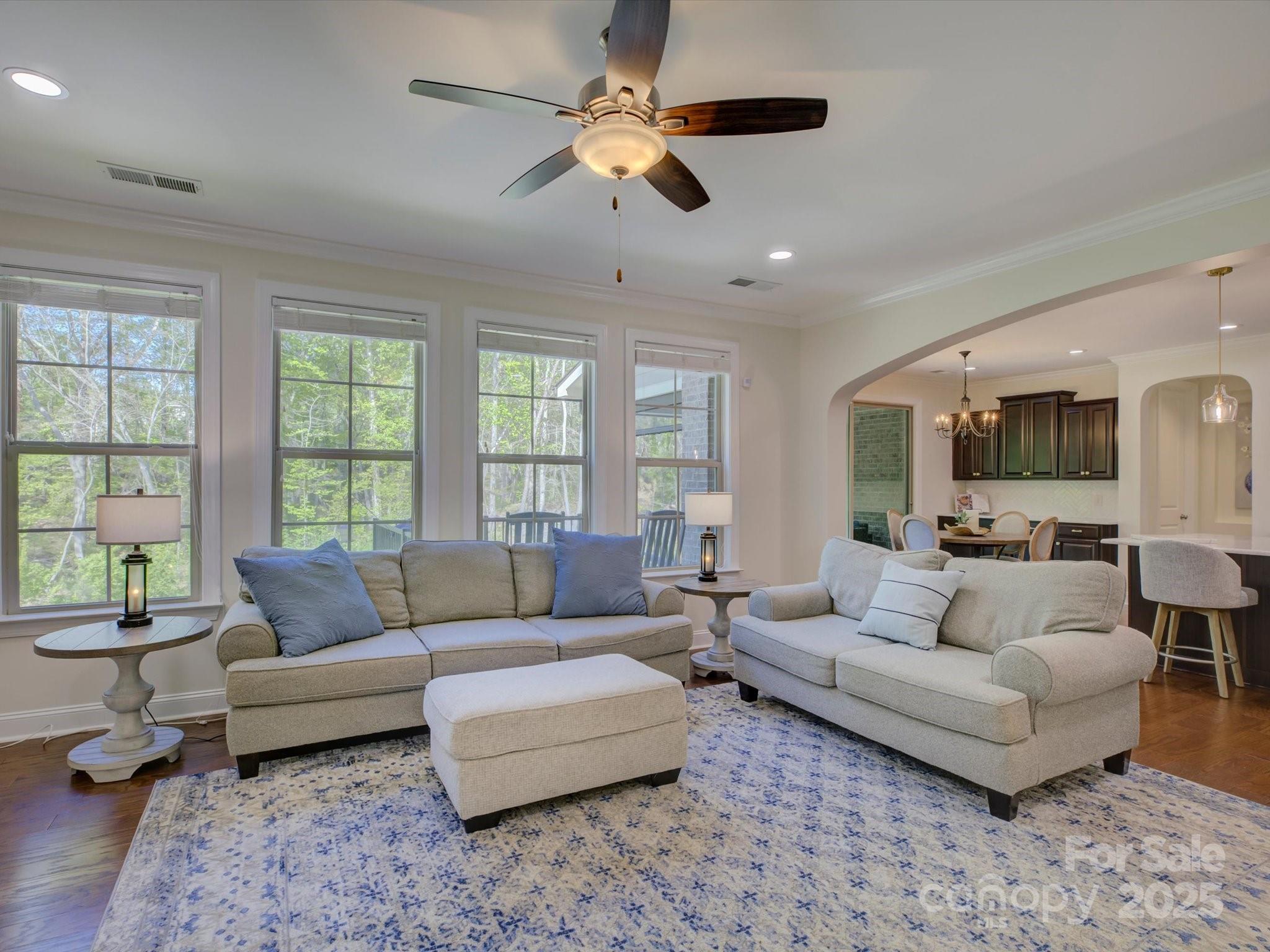 712 Chase Court Fort Mill, SC 29708 - Photo 19 of 48 a living room with furniture and a large window