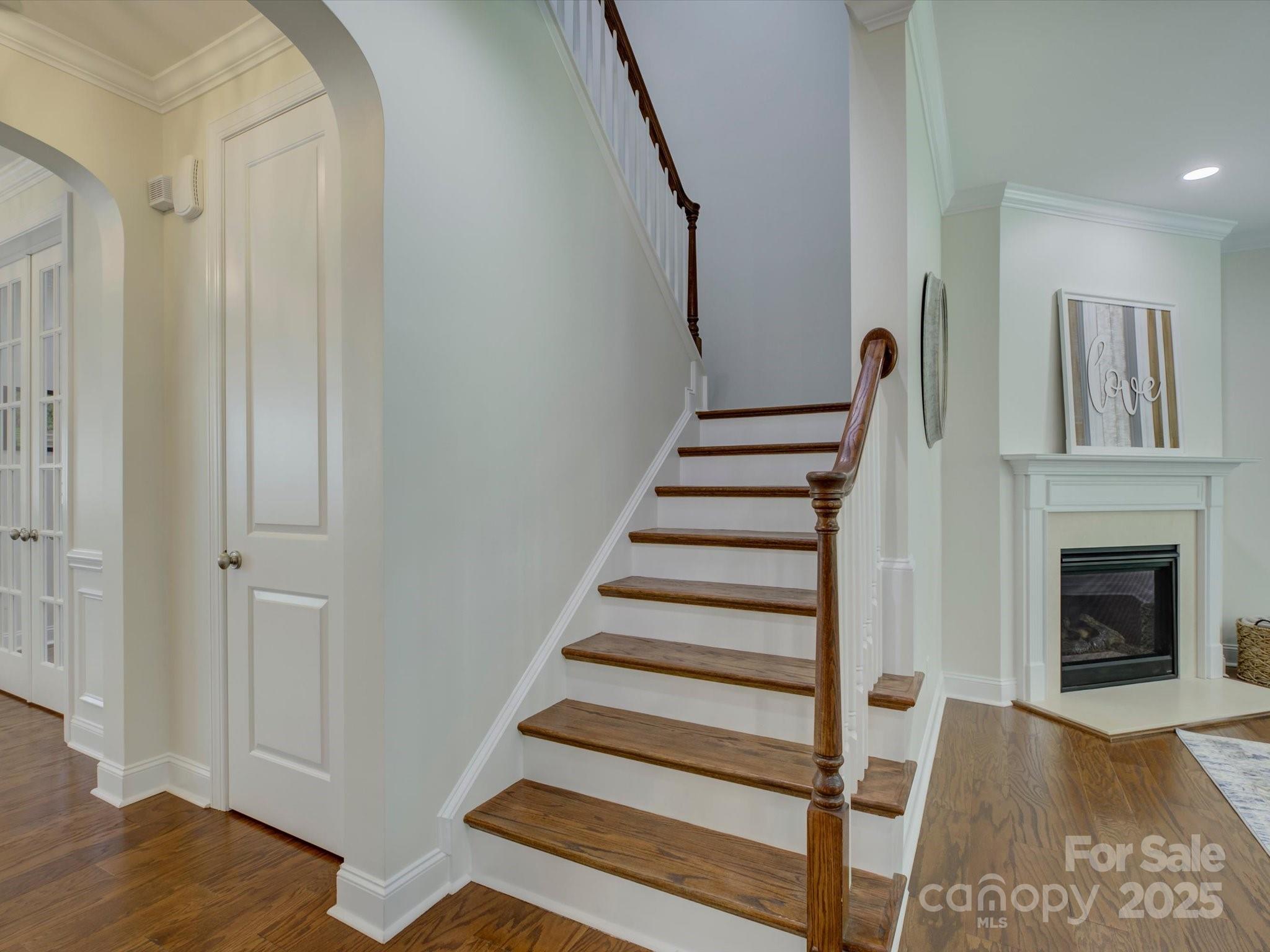 712 Chase Court Fort Mill, SC 29708 - Photo 25 of 48 a view of entryway with wooden floor and stairs