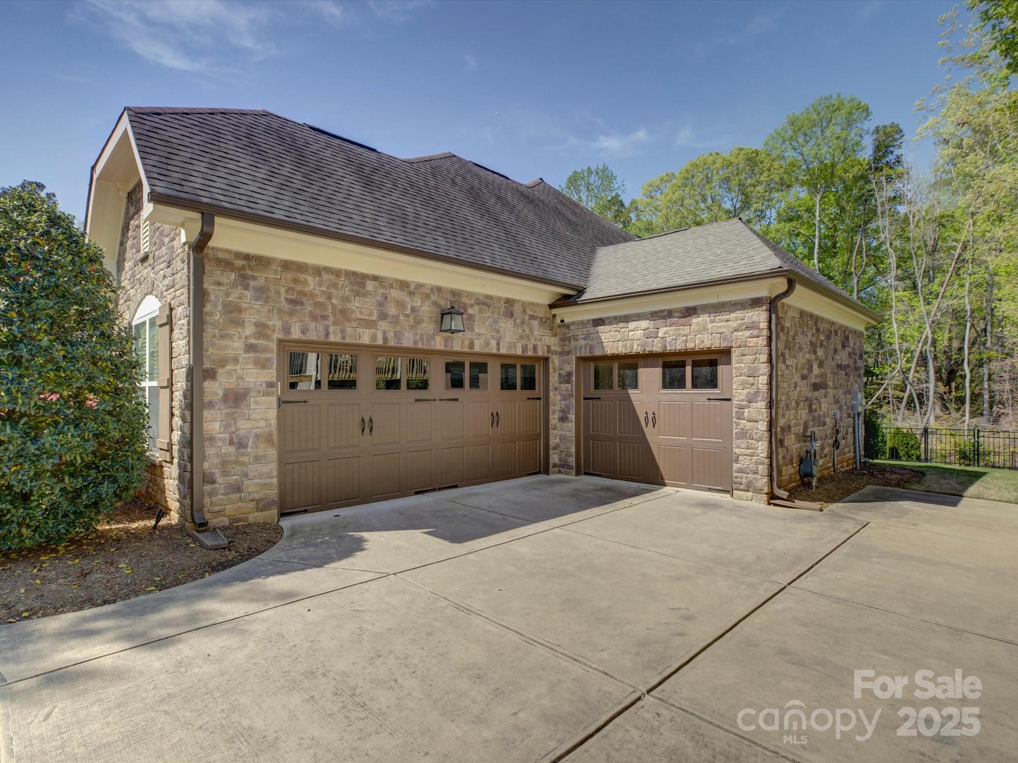 712 Chase Court Fort Mill, SC 29708 - Photo 34 of 48 a front view of a house with a garage