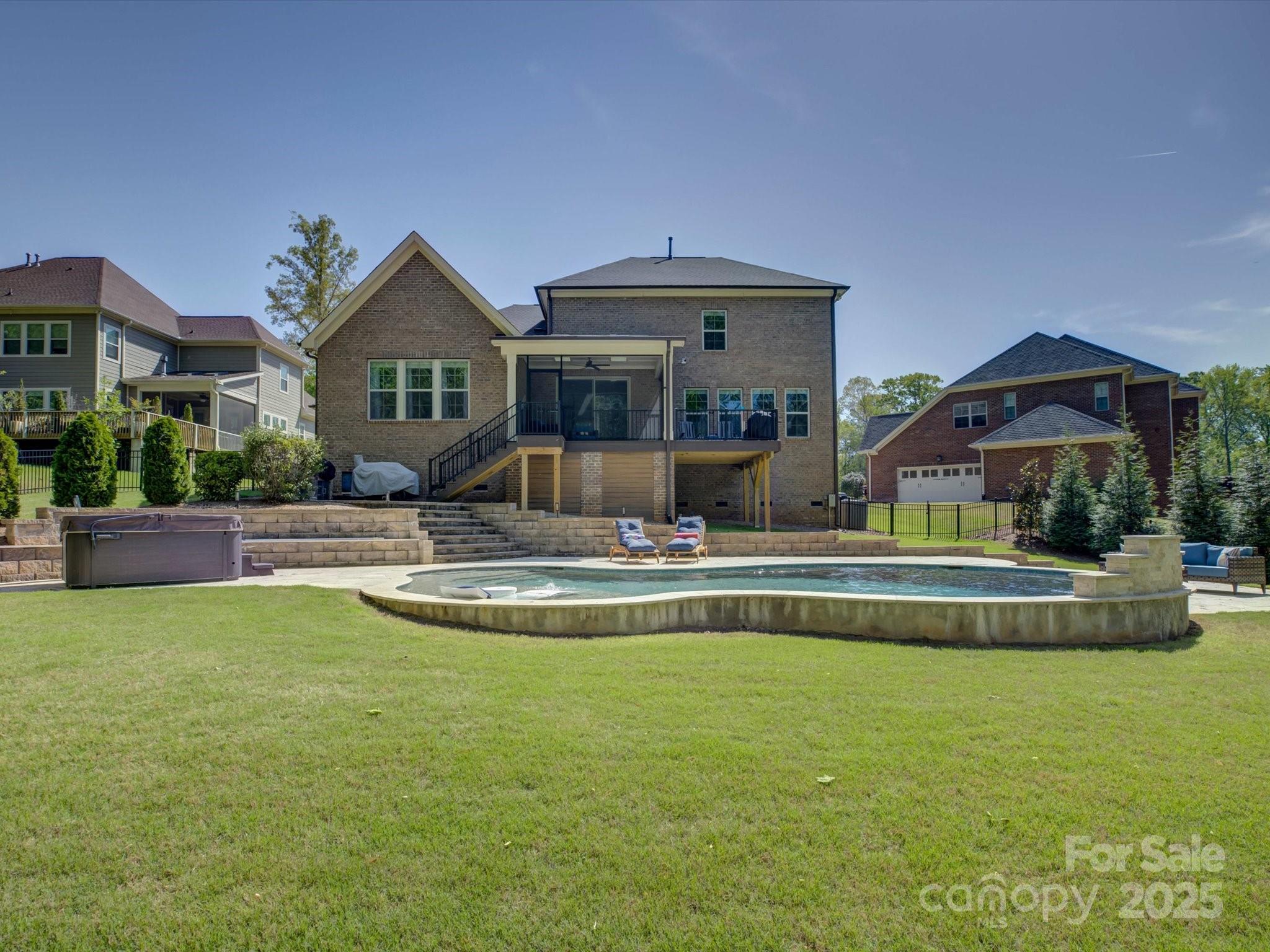 712 Chase Court Fort Mill, SC 29708 - Photo 38 of 48 a view of house with swimming pool yard and outdoor seating