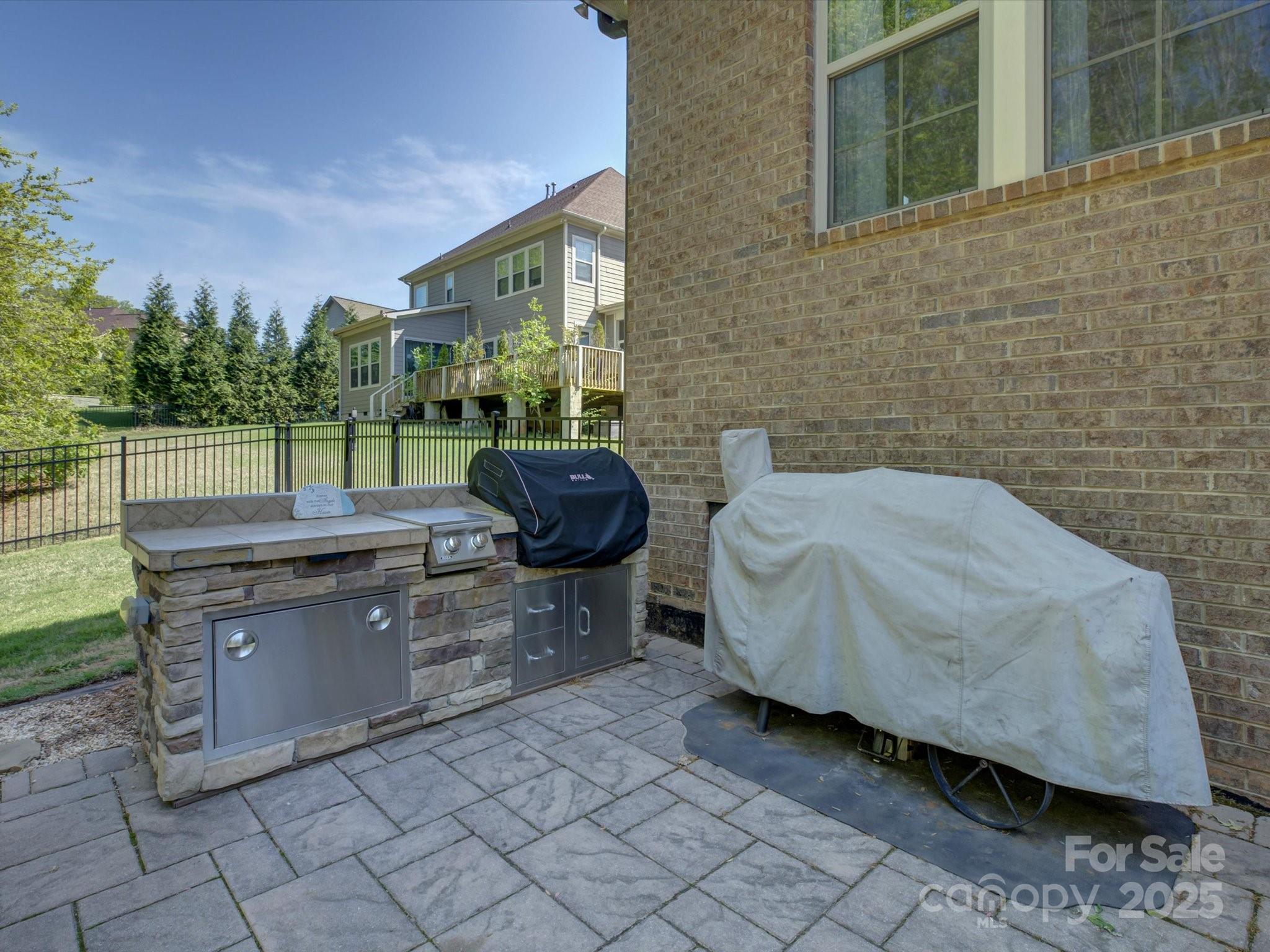 712 Chase Court Fort Mill, SC 29708 - Photo 42 of 48 a backyard of a house with seating space