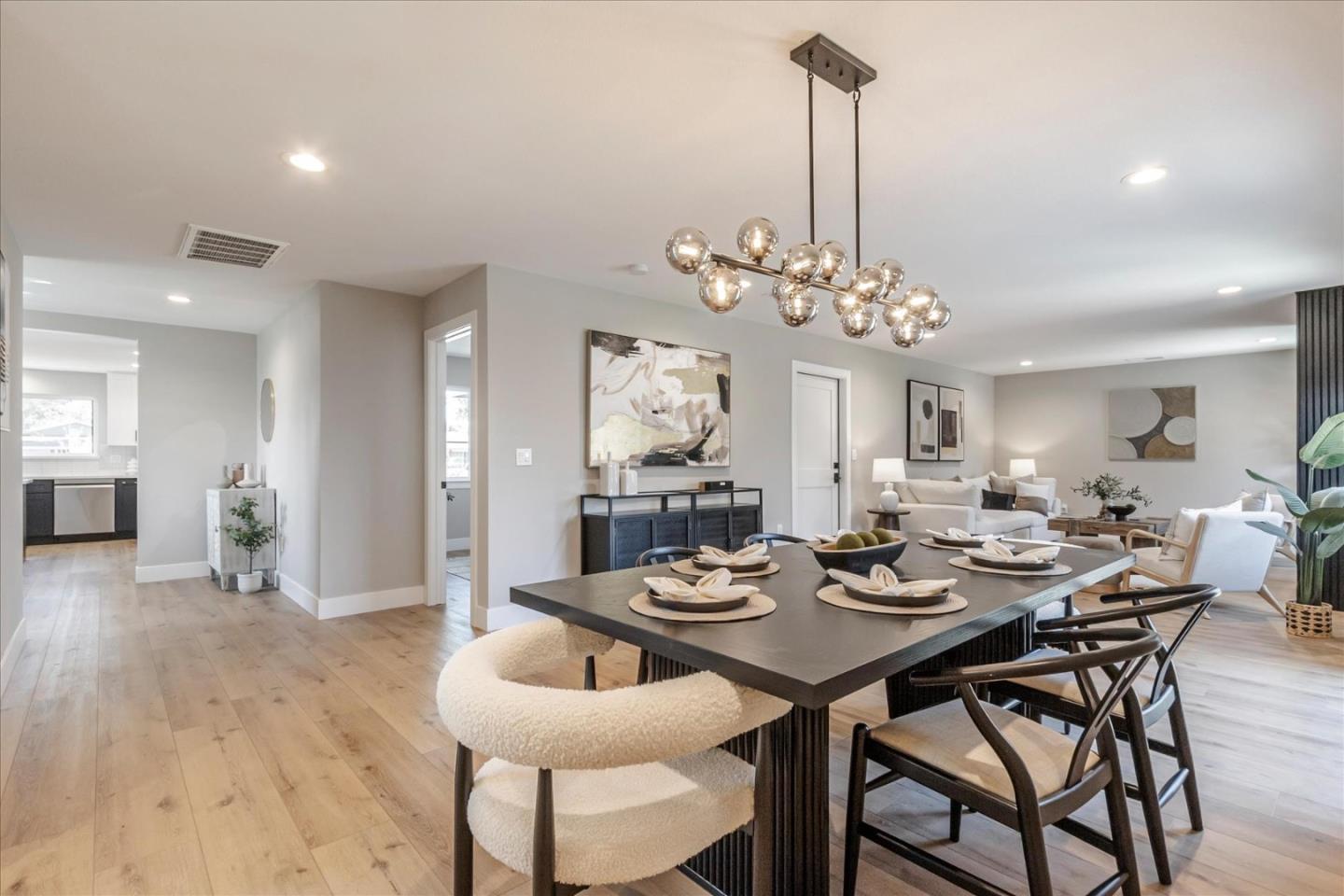 2575 Trimble Road San Jose, CA 95132 - Photo 14 of 74 a view of a dining room with furniture and wooden floor