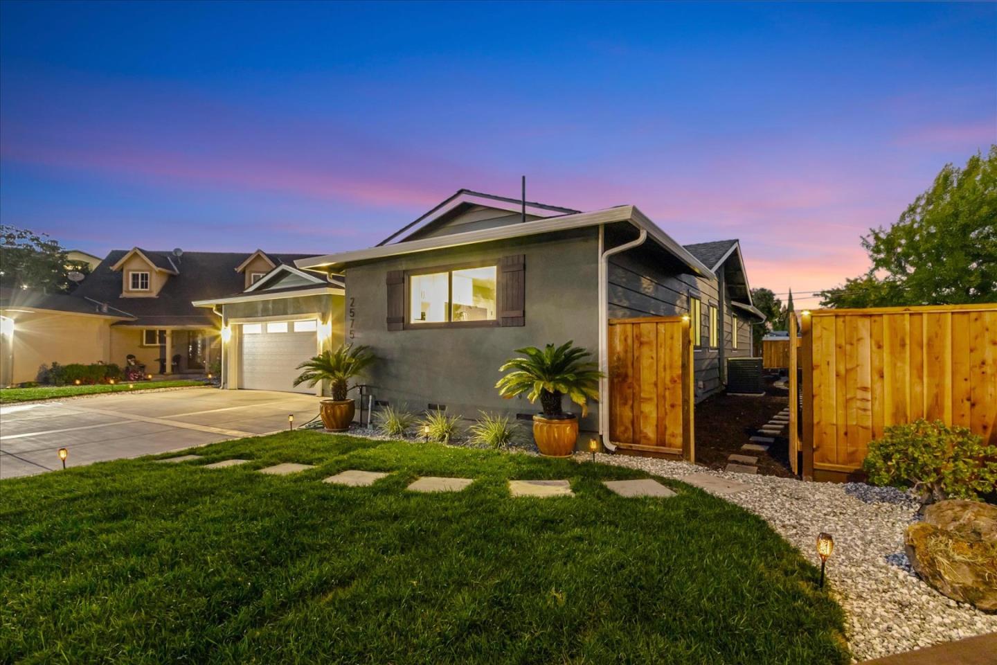 2575 Trimble Road San Jose, CA 95132 - Photo 53 of 74 a front view of a house with garden