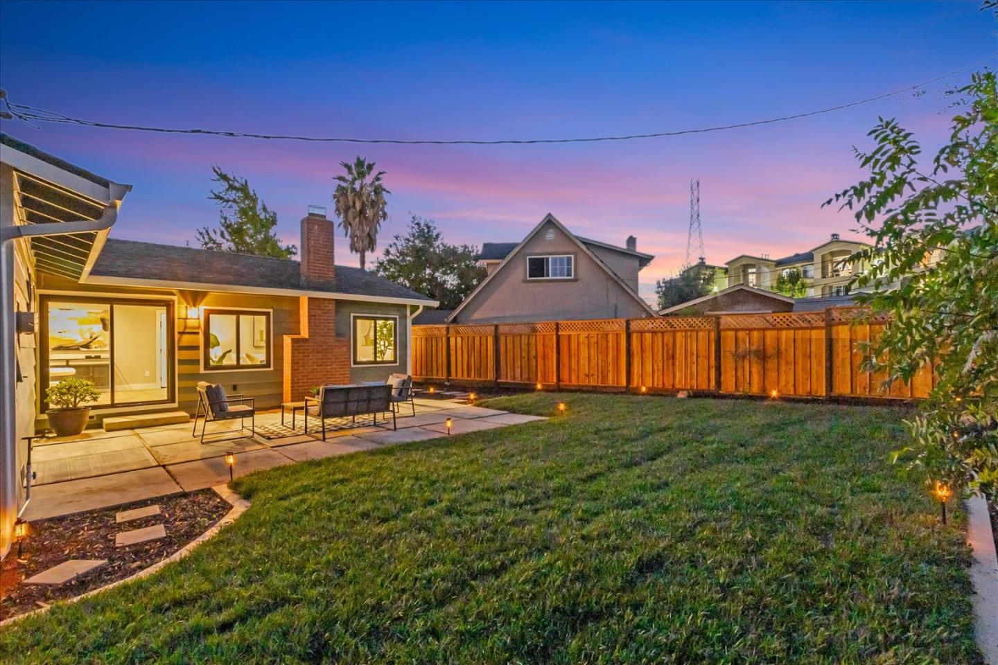 2575 Trimble Road San Jose, CA 95132 - Photo 54 of 74 a front view of a house with a yard