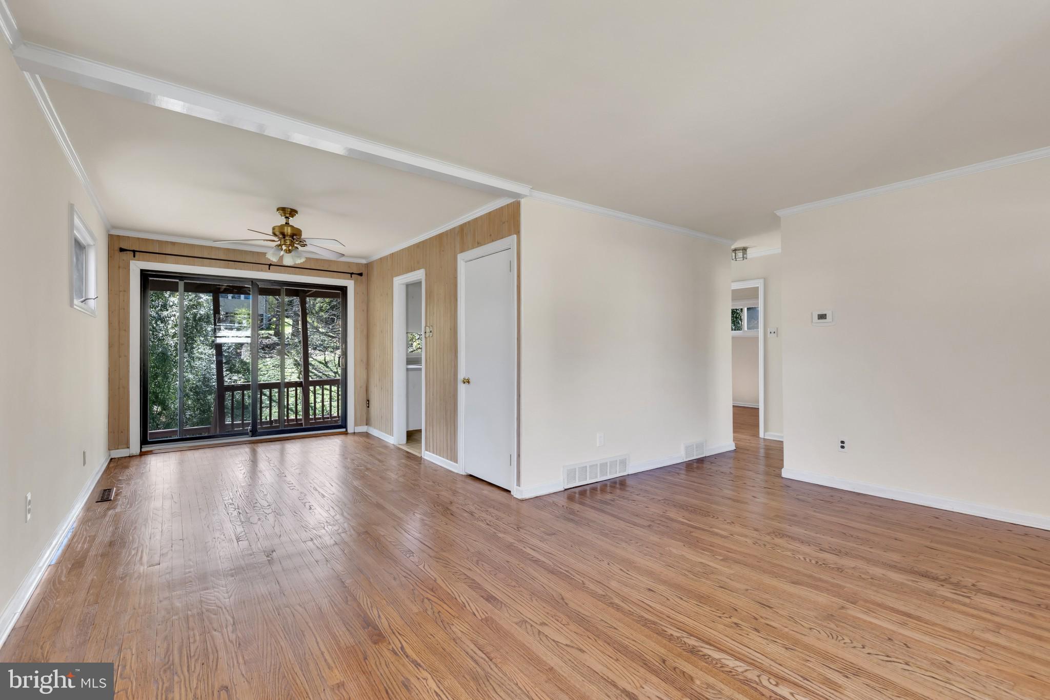 58 Eastwood Road Berwyn, PA 19312 - Photo 7 of 35 Living Room With Dining Area and Sliders To Deck