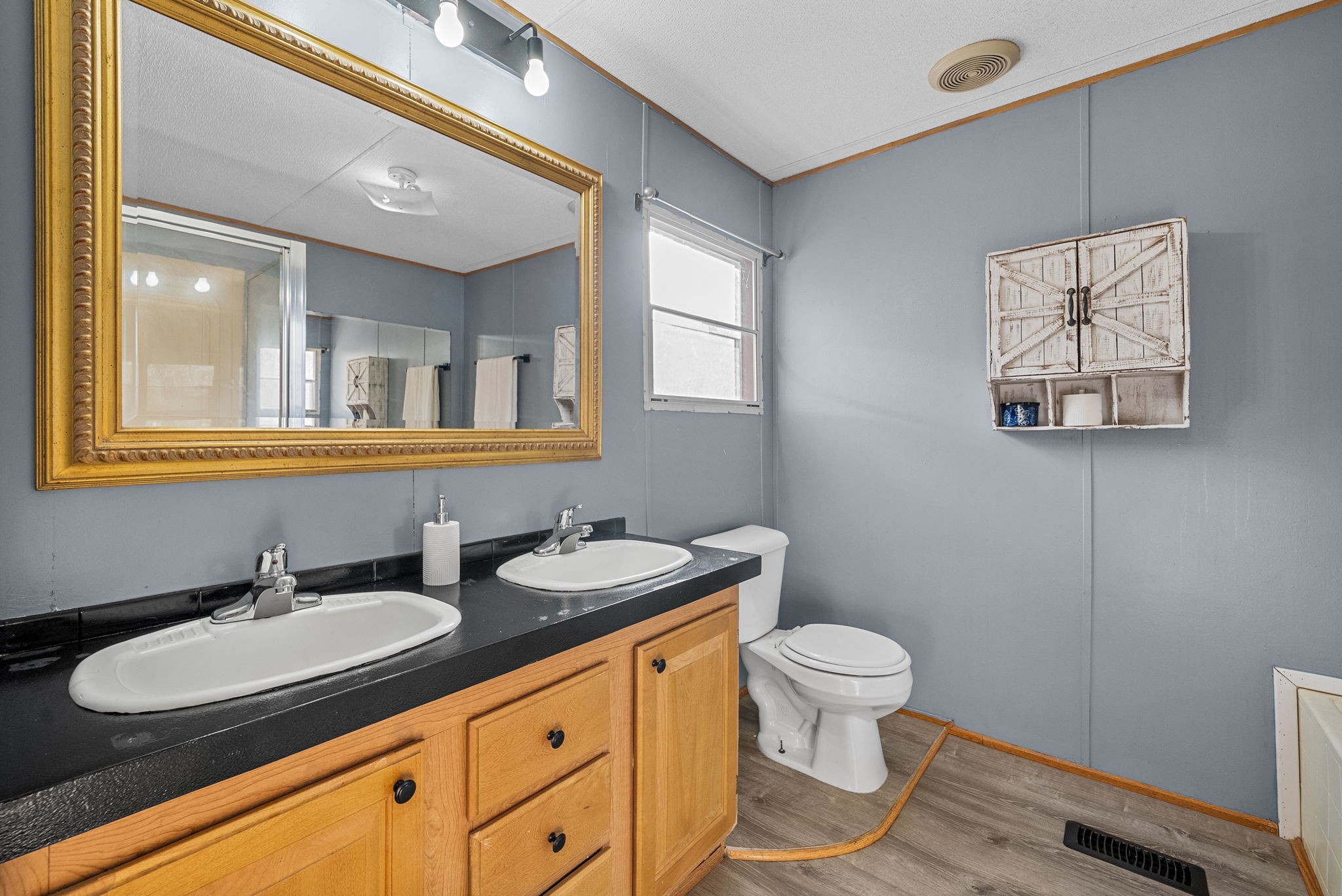 1196 Pickle Knight Road Joelton, TN 37080 - Photo 14 of 32 a bathroom with a toilet sink and mirror