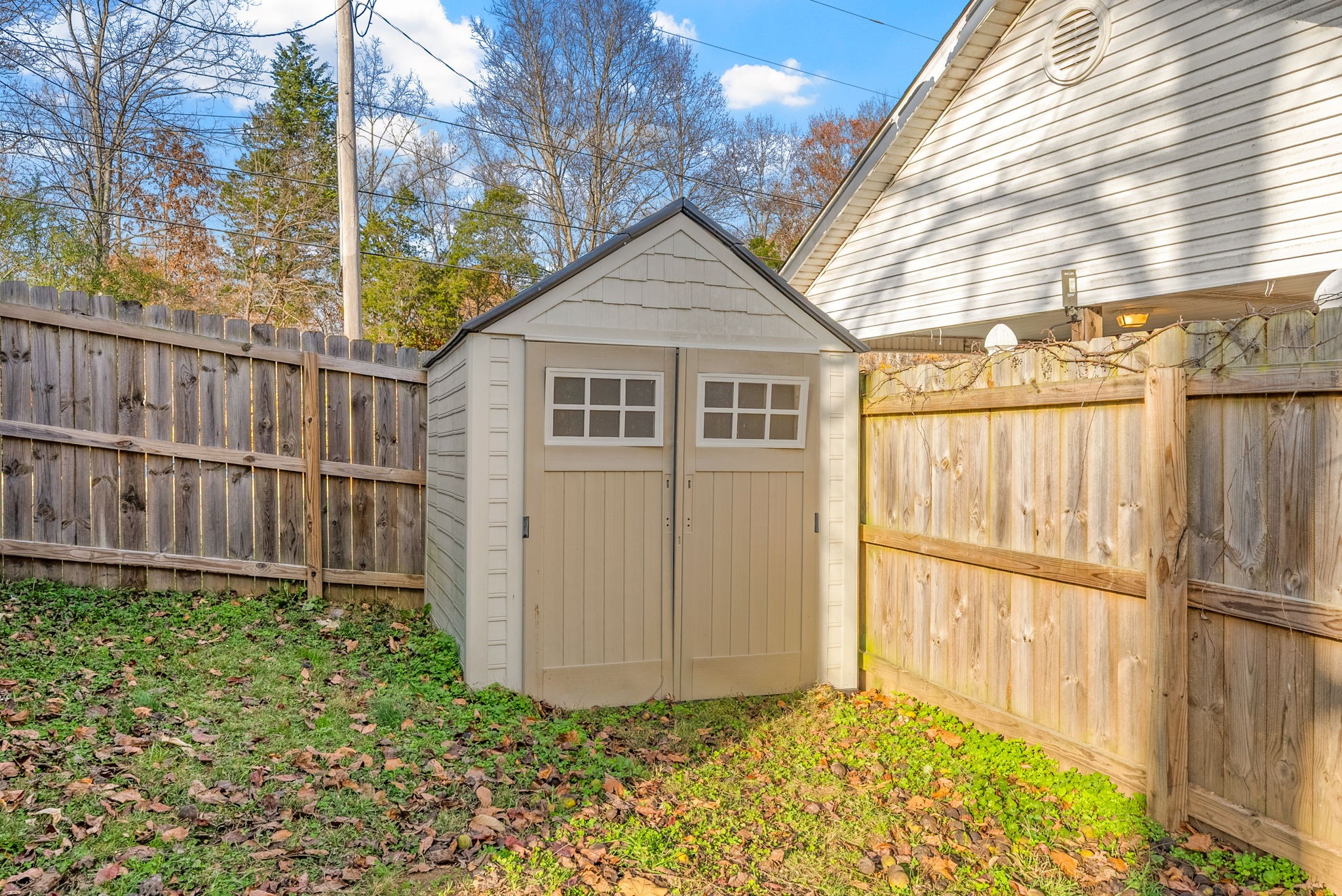 1196 Pickle Knight Road Joelton, TN 37080 - Photo 24 of 32 a view of backyard with small cabin and wooden fence